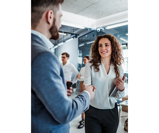 Two colleagues shake hands